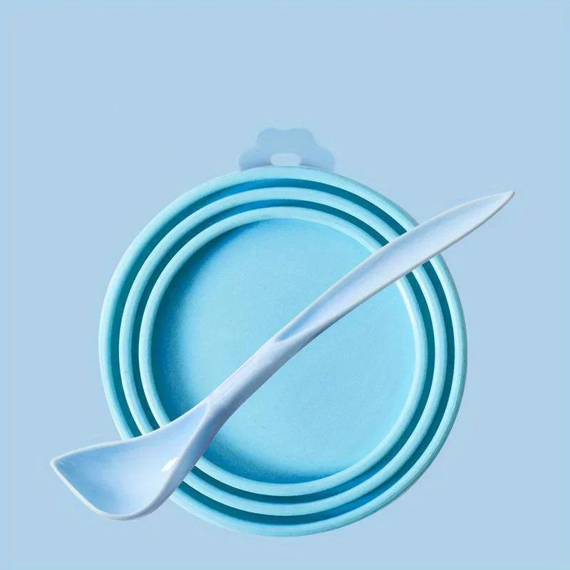 Pet food can lid with spoon