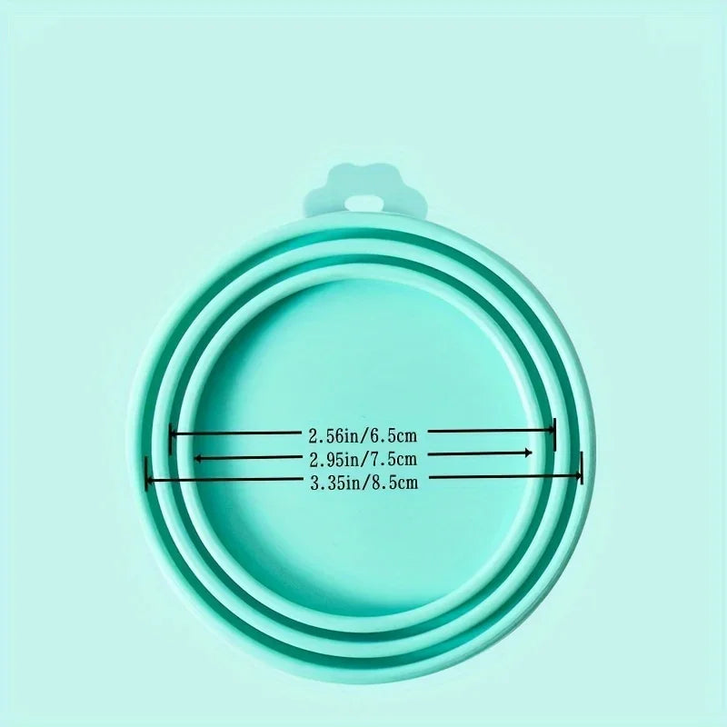 Pet food can lid with spoon
